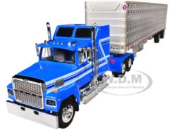 Ford LTL 9000 60" Aerodyne Sleeper With Wilson PSAL Stockmaster Livestock Trailer Blue With Stripes 1/64 Diecast Model By DCP/First Gear