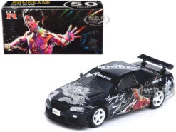 Nissan Skyline GT-R (R34) RHD (Right Hand Drive) Black "Bruce Lee Legacy 50 Year Anniversary" 1/64 Diecast Model Car By Inno Models