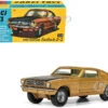 Ford Mustang Fastback 2+2 Gold Metallic And Black Diecast Model Car By Corgi